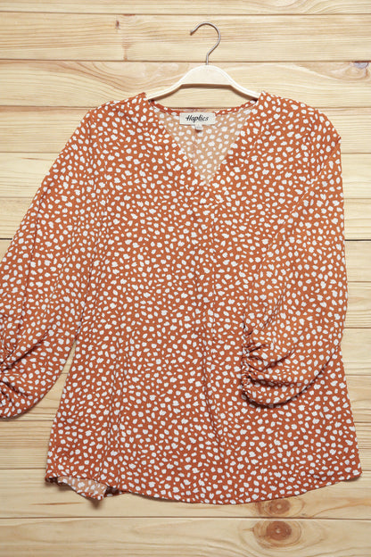 Rust Abstract Dot V Neck Woven Top