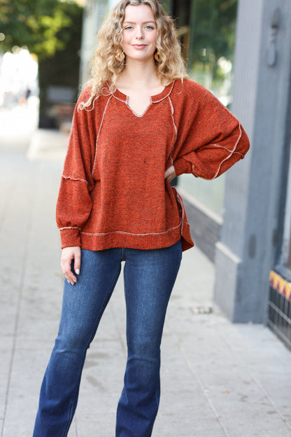 The Slouchy Rust Two Tone Knit Notched Raglan Top