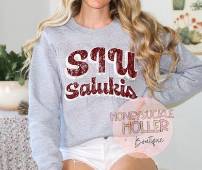 Distressed SIU salukis